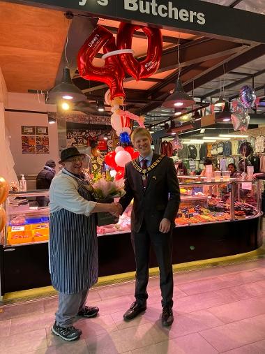 Adrian Livesey shaking hands with the Mayor of Preston